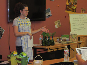 Malinda Crawley teaching an herb class in the community room of the library July 2013